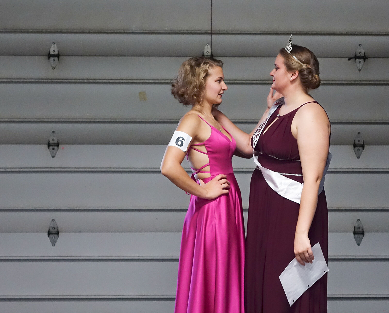 Cathrine Mayhan speaks with her sister Abigail Mayhan